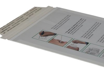 Self-mailer envelope with full size clear film pocket window.